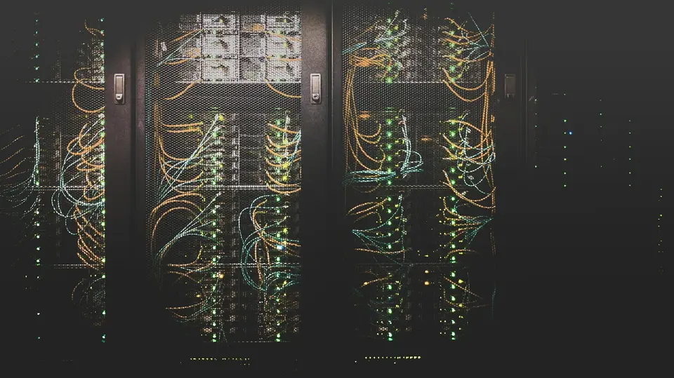 Server racks and cables in a data center.